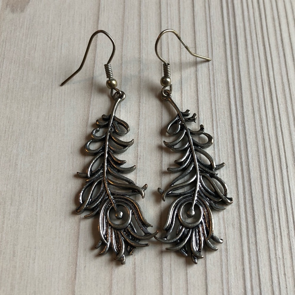 Silver peacock feather earrings